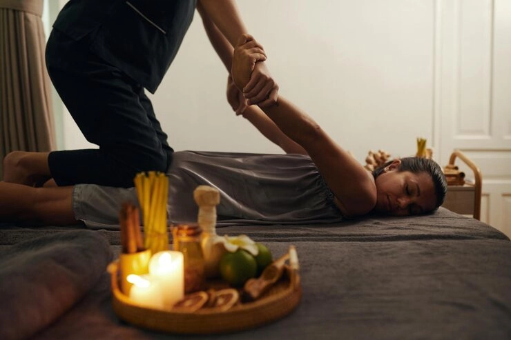 Therapist performing traditional Balinese massage