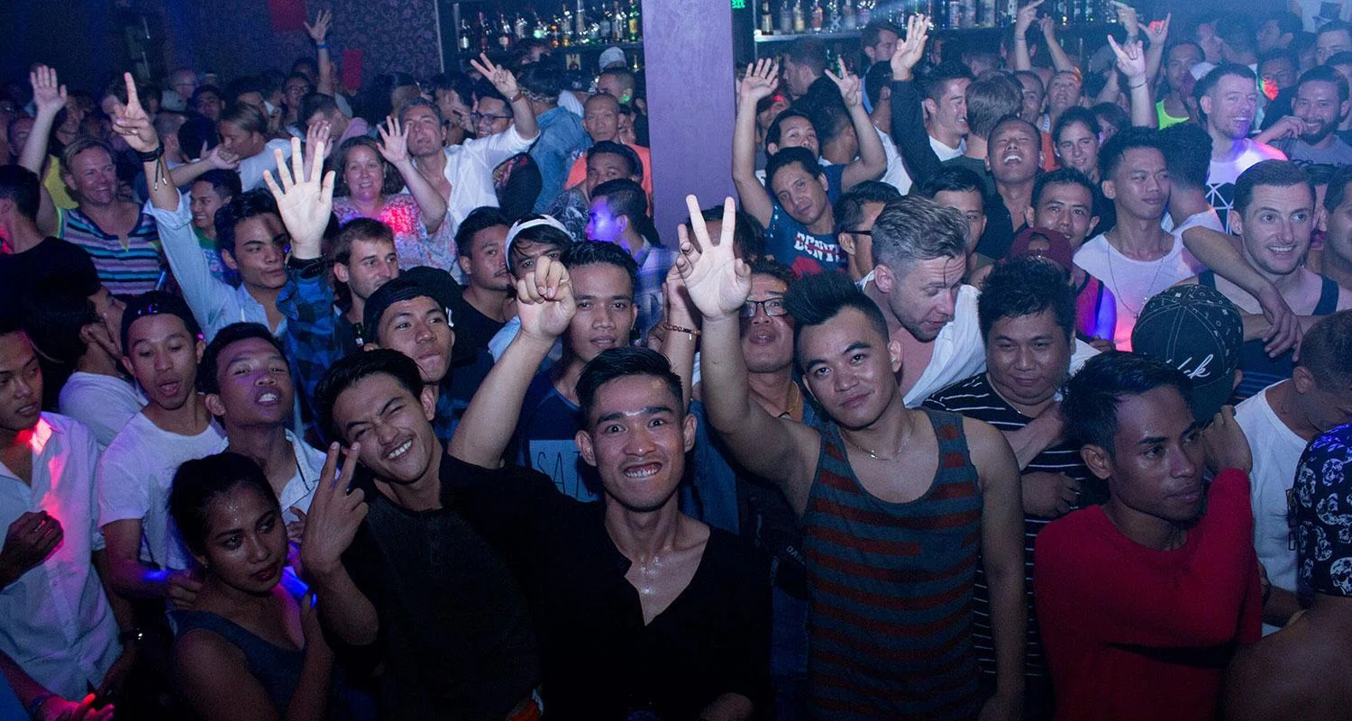 Lively crowd enjoying a gay-friendly nightclub in Bali