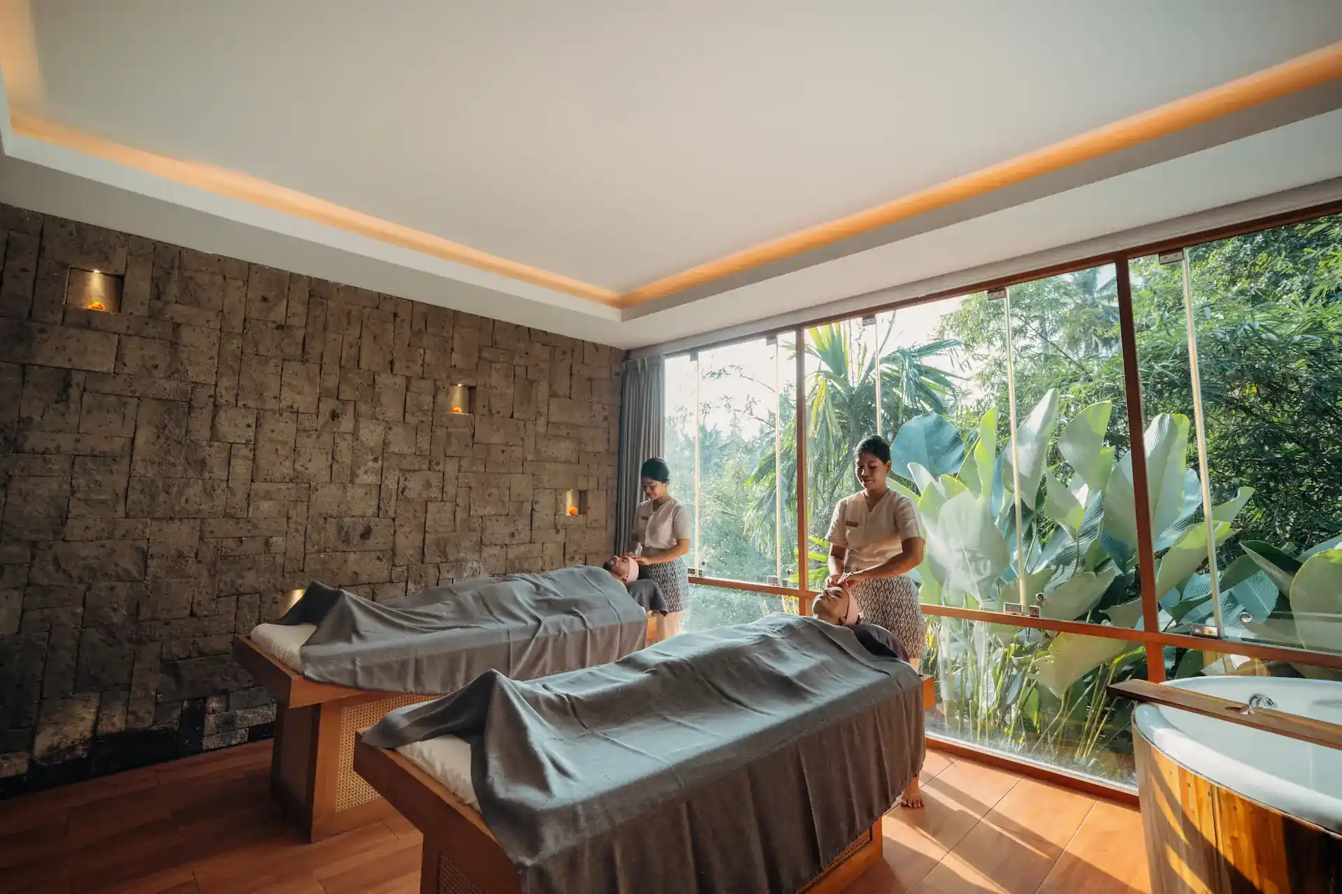 Couple’s spa treatment at Svaha Spa Bisma in Ubud, Bali, with jungle views and relaxing ambiance