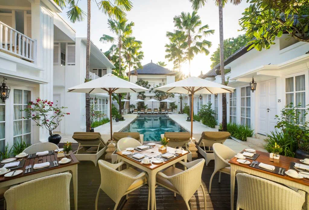 Poolside view at The Colony Hotel Bali, perfect for cooling down after a workout or gym session in Seminyak