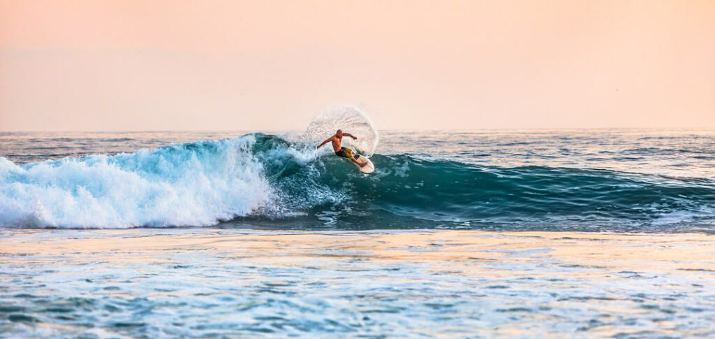 surfing in bali beach