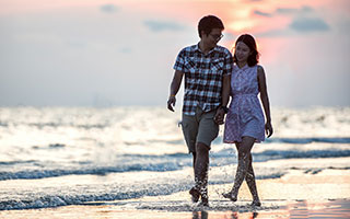 couples walking by the beach in bali