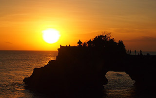 tanah lot with sunset background