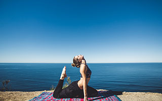 yoga in the hill of a beach bali