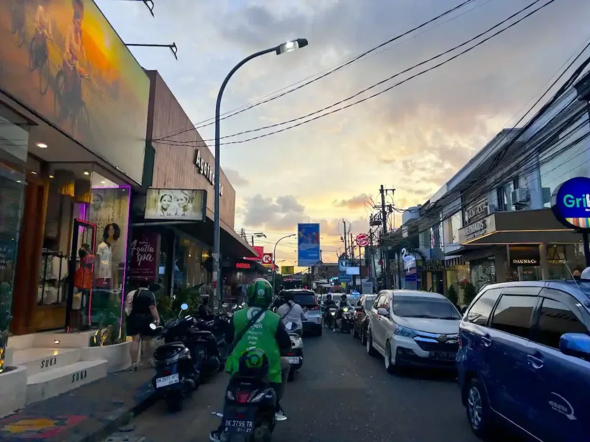 Typical road scene in Seminyak with passing vehicles