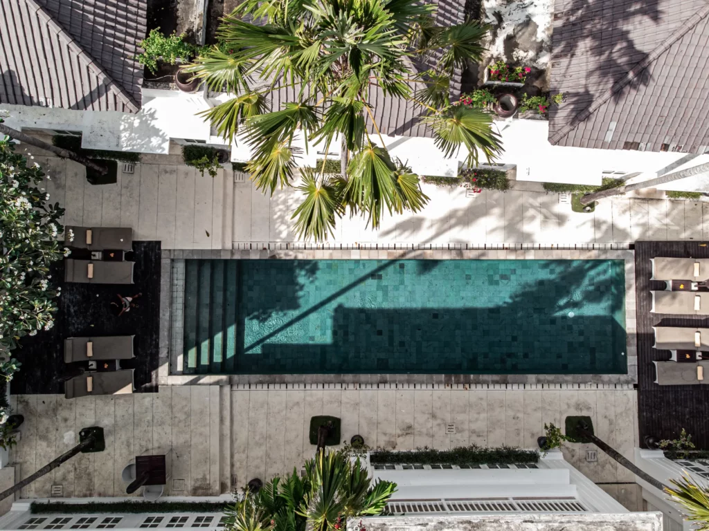 Aerial View of the Pool Area at The Colony Hotel Bali, Boutique Luxury Stay in Seminyak