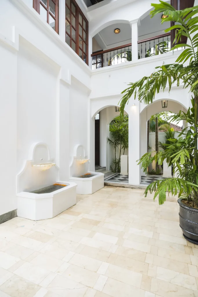 One of area of The Colony Hotel Bali featuring white colonial-style architecture