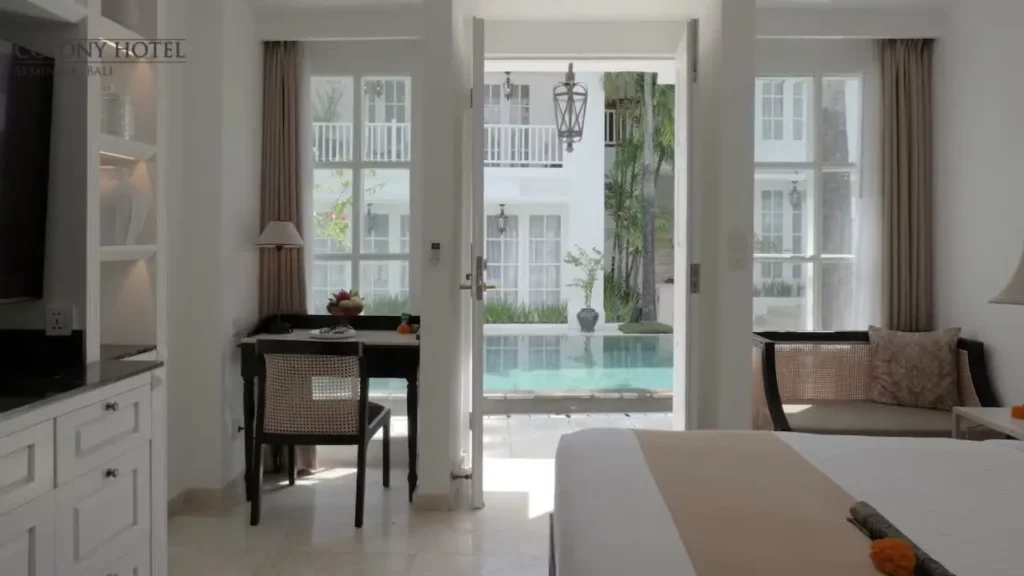 View from Deluxe Room Bedroom to Pool Area at The Colony Hotel Bali, Boutique Stay in Seminyak