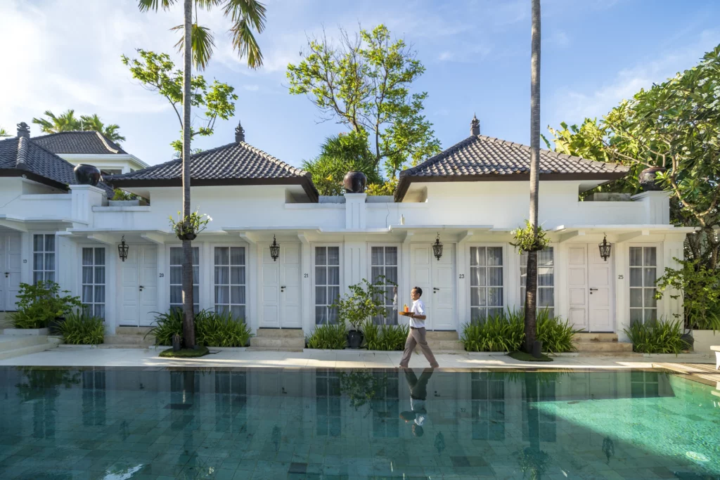Tranquil poolside setting at The Colony Hotel Bali, Seminyak
