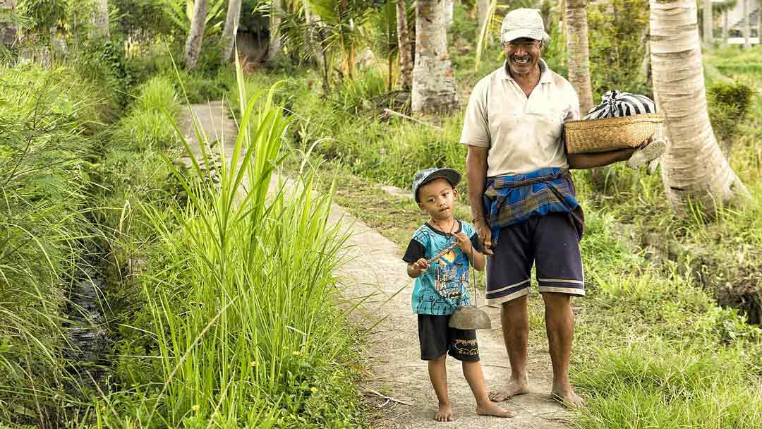 Balinese people with children of indonesian