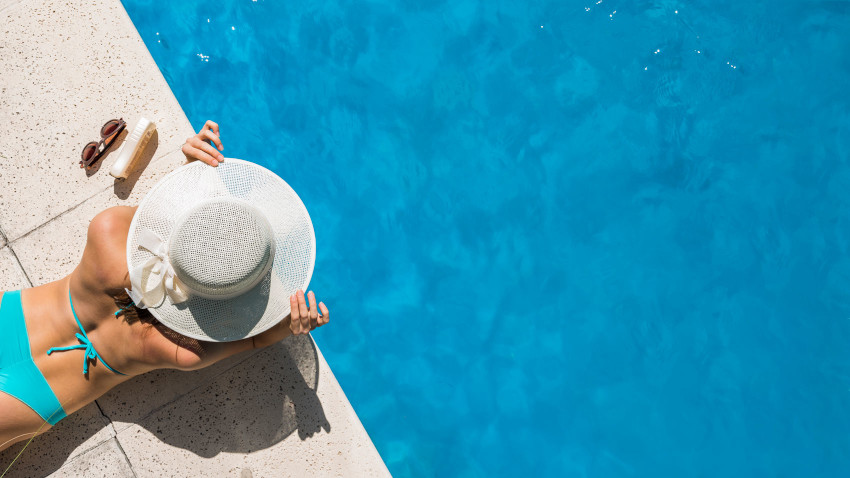 Sunbathing in pool club