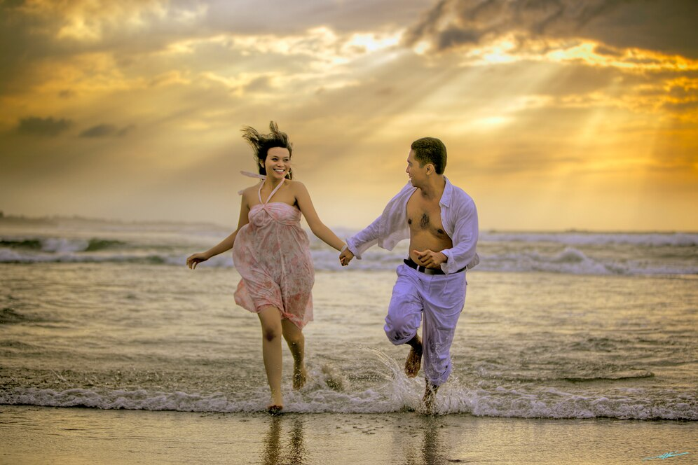 couples at seminyak beach
