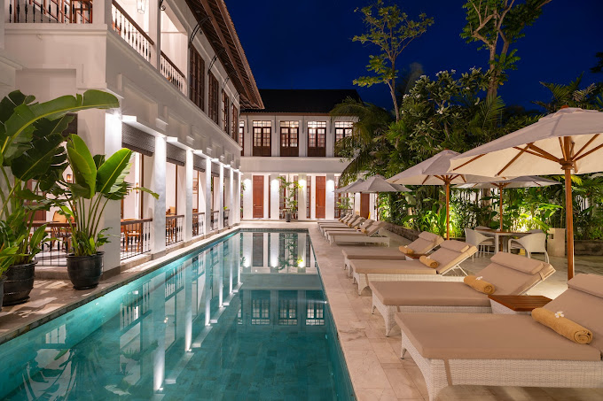 the colony hotel pool view at night